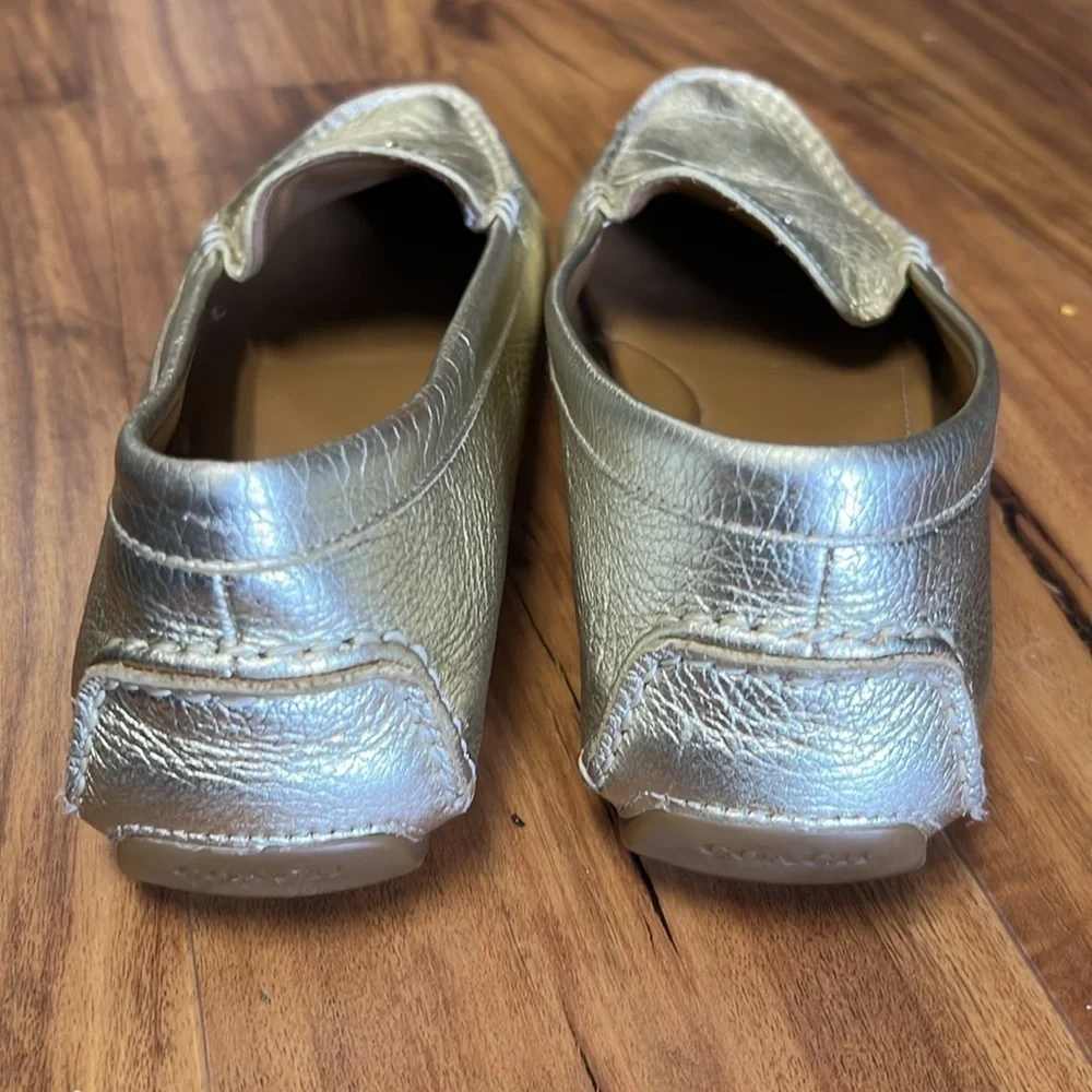 Coach women’s gold loafer Size 7 1/2